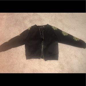 Black bomber jacket with gold embroidered sleeves